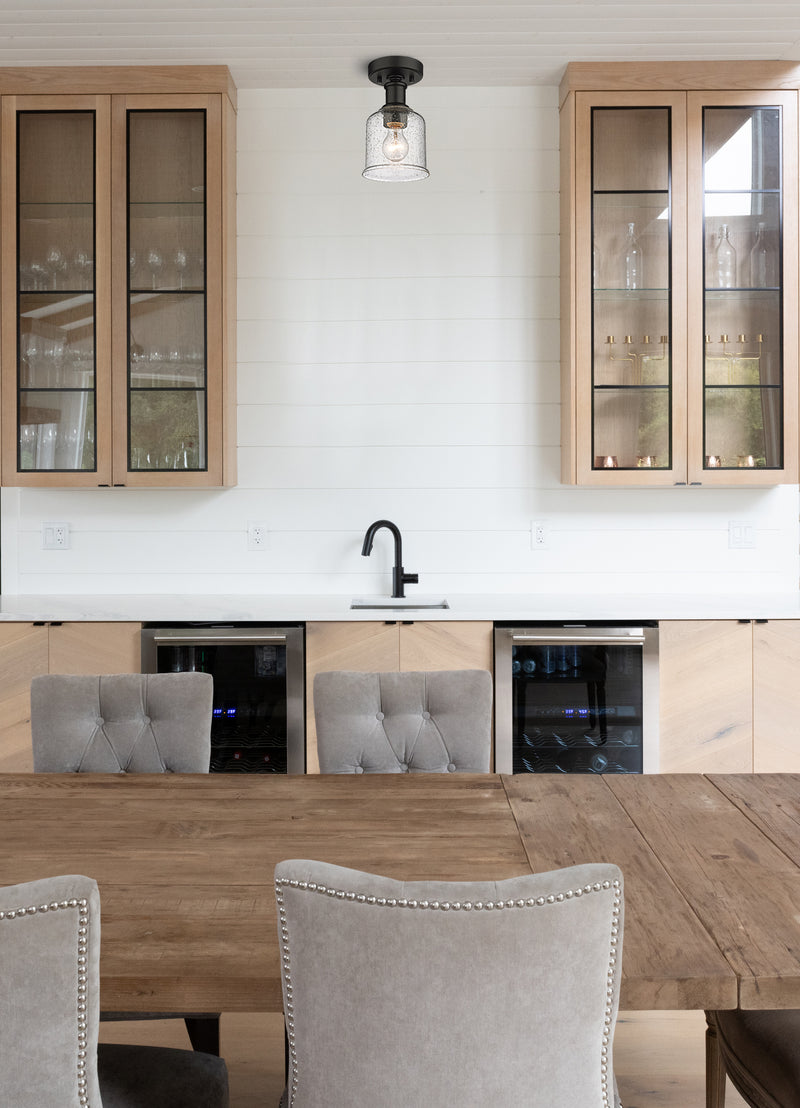 Bryant 1 Light 5.5" Flush Mount in Matte Black in a room setting