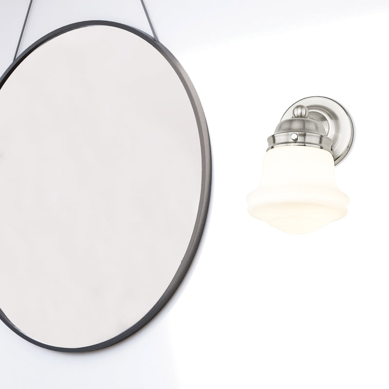 Vaughn 1 Light 6" Wall Sconce in Brushed Nickel in a room setting