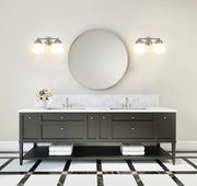 Vaughn 2 Light 15.5" Vanity in Brushed Nickel in a room setting