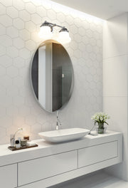 Vaughn 2 Light 15.5" Vanity in Chrome in a room setting