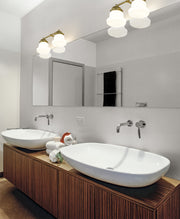 Vaughn 2 Light 15.5" Vanity in Luxe Gold in a room setting