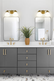 Vaughn 2 Light 15.5" Vanity in Luxe Gold in a room setting