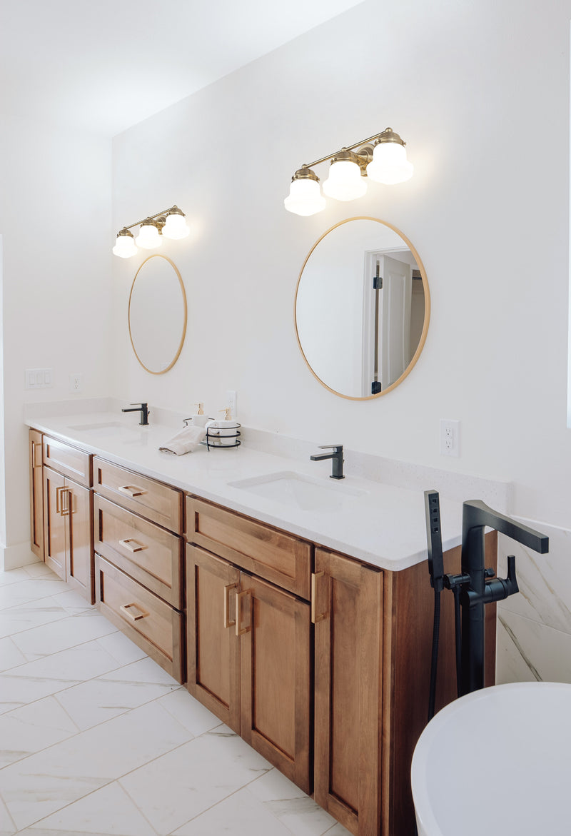 Vaughn 3 Light 22.5" Vanity in Luxe Gold in a room setting