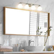 Vaughn 4 Light 31.5" Vanity in Brushed Nickel in a room setting