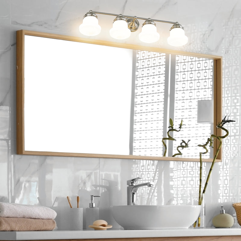 Vaughn 4 Light 31.5" Vanity in Brushed Nickel in a room setting