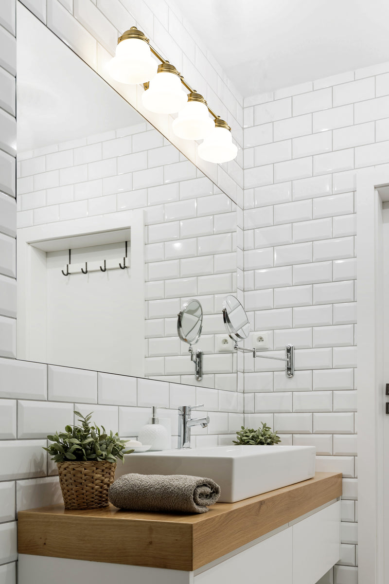 Vaughn 4 Light 31.5" Vanity in Luxe Gold in a room setting