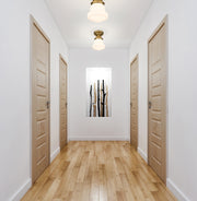 Vaughn 1 Light 6" Flush Mount in Heritage Brass in a room setting