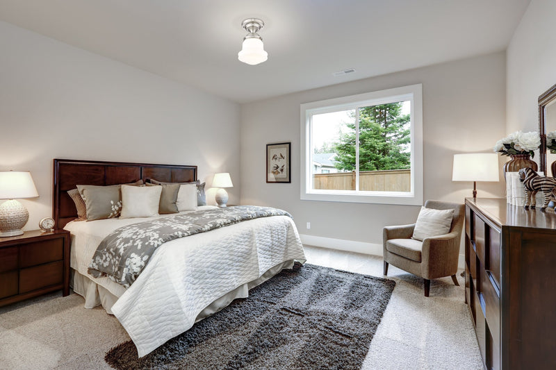 Vaughn 1 Light 10.5" Flush Mount in Brushed Nickel in a room setting