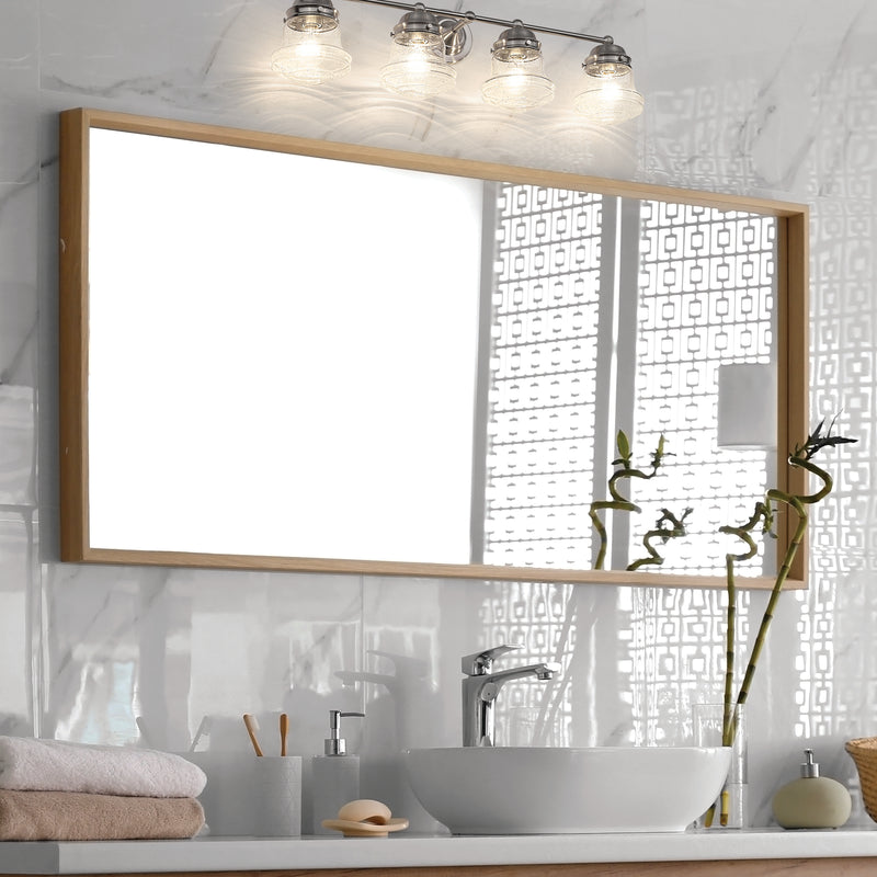 Vaughn 4 Light 31.5" Vanity in Brushed Nickel in a room setting