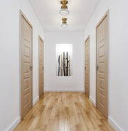 Vaughn 1 Light 6" Flush Mount in Heritage Brass in a room setting