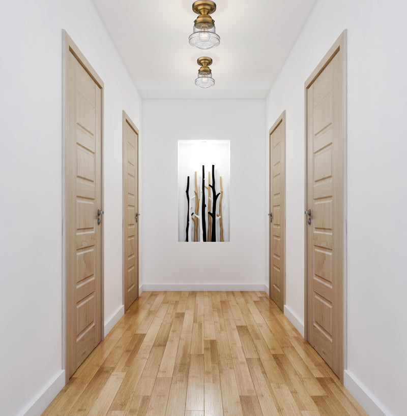 Vaughn 1 Light 6" Flush Mount in Heritage Brass in a room setting
