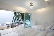Vaughn 1 Light 10.5" Flush Mount in Brushed Nickel in a room setting