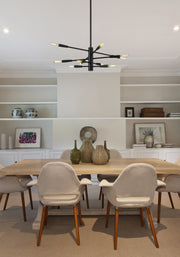 Ascension 10 Light 23.25" Chandelier in Matte Black in a room setting