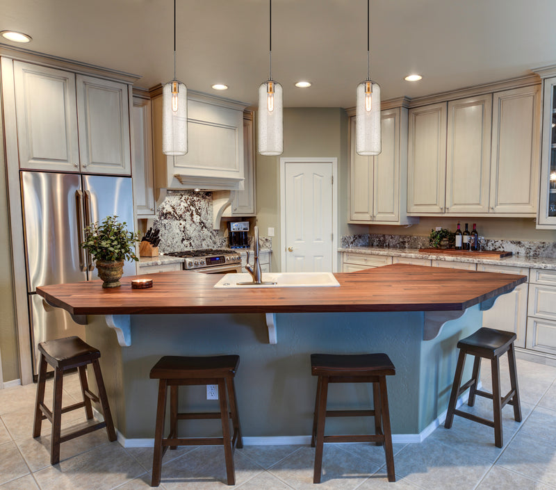 Monty 1 Light 5.25" Pendant, 22" Tall in Brushed Nickel in a room setting