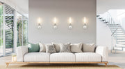 Beau 1 Light 4.5" Wall Sconce, Clear Ribbed Shade in Brushed Nickel in a room setting