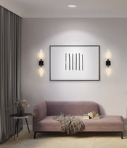Beau 2 Light 4.5" Wall Sconce in Matte Black in a room setting