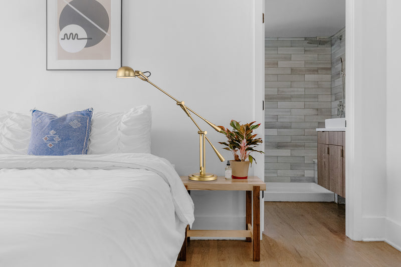 Grammercy Park 1 Light 10" Table Lamp in Heritage Brass in a room setting