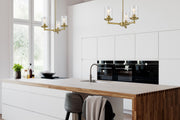 Thayer 3 Light 19" Chandelier in Luxe Gold in a room setting