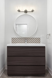 Thayer 3 Light 22.5" Vanity in Brushed Nickel in a room setting