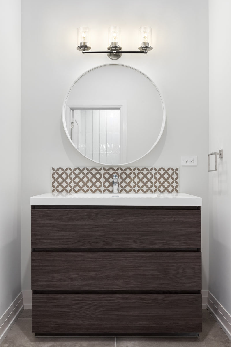 Thayer 3 Light 22.5" Vanity in Brushed Nickel in a room setting