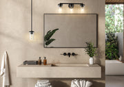 Thayer 3 Light 22.5" Vanity in Matte Black in a room setting