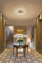 Thayer 3 Light 13" Flush Mount in Luxe Gold in a room setting