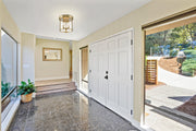 Thayer 3 Light 13" Flush Mount in Luxe Gold in a room setting