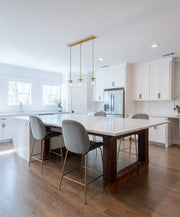Thayer 3 Light 4.75" Pendant, Luxe Gold in Luxe Gold in a room setting
