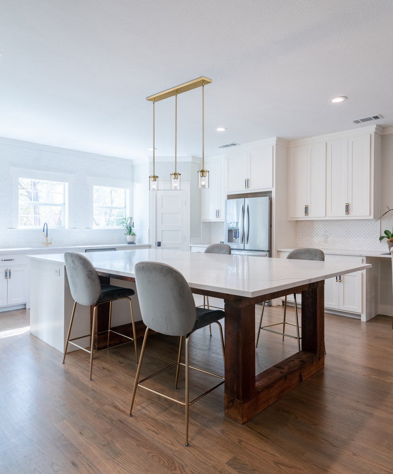 Thayer 3 Light 4.75" Pendant, Luxe Gold in Luxe Gold in a room setting