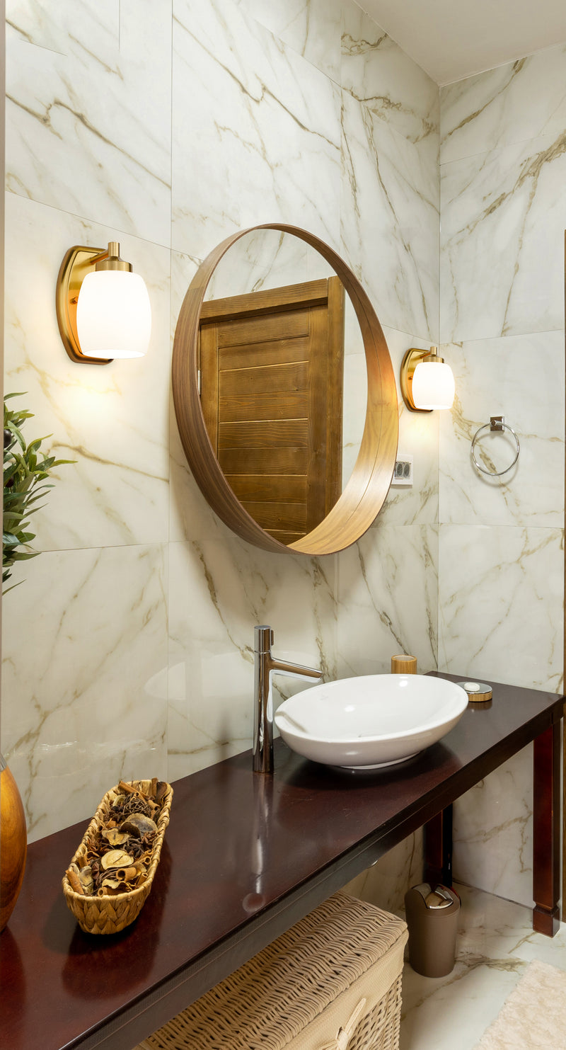 Kendrick 1 Light 4.75" Wall Sconce in Luxe Gold in a room setting