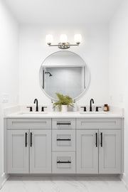 Kendrick 3 Light 23" Vanity in Brushed Nickel in a room setting