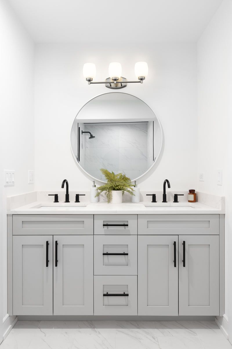 Kendrick 3 Light 23" Vanity in Brushed Nickel in a room setting