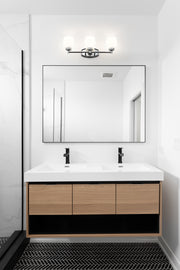 Kendrick 3 Light 23" Vanity in Chrome in a room setting