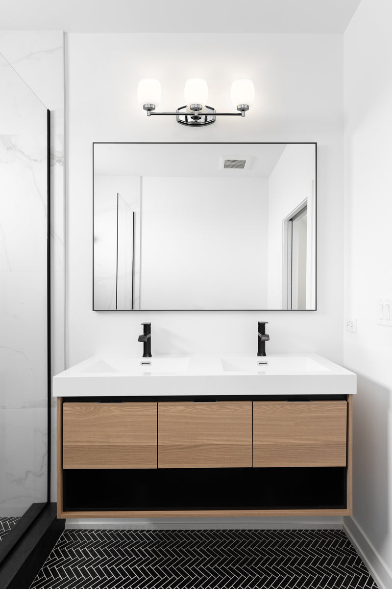 Kendrick 3 Light 23" Vanity in Chrome in a room setting