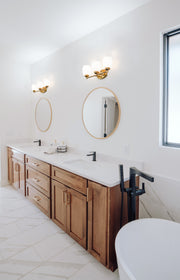 Kendrick 3 Light 23" Vanity in Luxe Gold in a room setting
