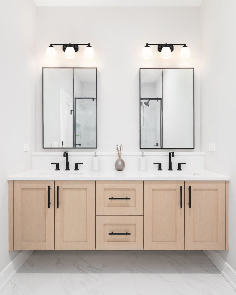Kendrick 3 Light 23" Vanity in Matte Black in a room setting