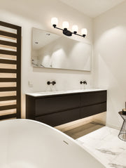 Kendrick 4 Light 31.25" Vanity in Matte Black in a room setting