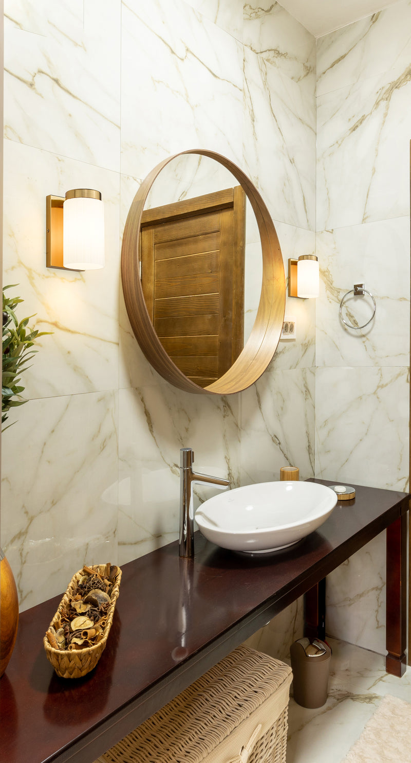 Burk 1 Light 4.25" Wall Sconce in Luxe Gold in a room setting