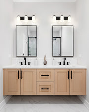 Burk 3 Light 22.5" Vanity in Matte Black in a room setting