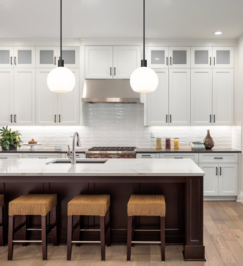 Margo 1 Light 9.75" Pendant in Matte Black in a room setting