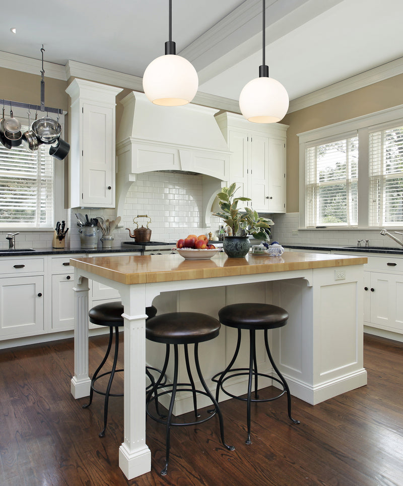 Margo 1 Light 9.75" Pendant in Matte Black in a room setting