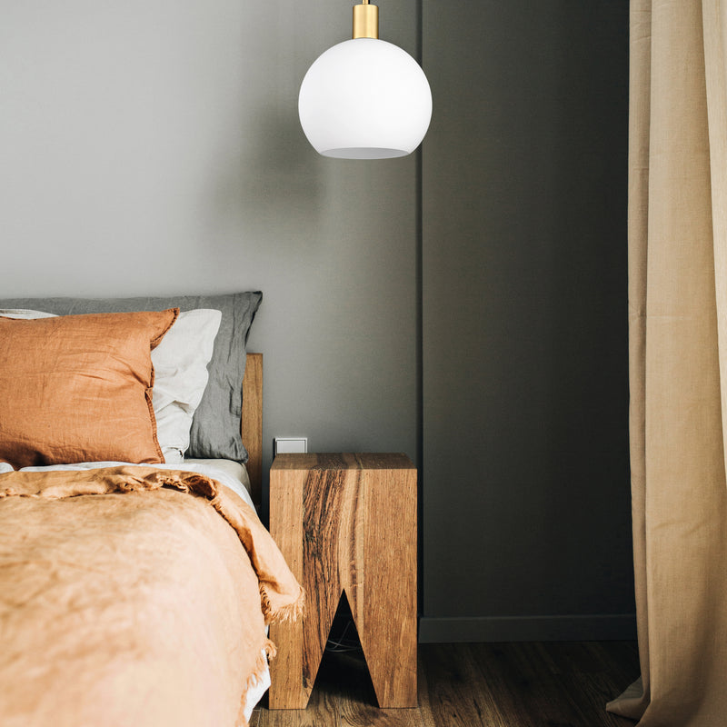 Margo 1 Light 9.75" Pendant in Olde Brass in a room setting