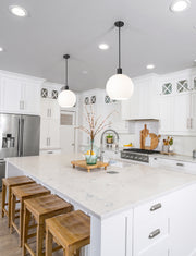 Margo 1 Light 13.75" Pendant in Matte Black in a room setting