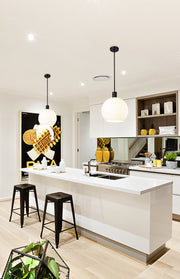 Margo 1 Light 13.75" Pendant in Matte Black in a room setting