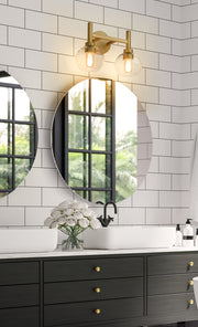 Sutton 2 Light 15.75" Vanity in Brushed Gold in a room setting