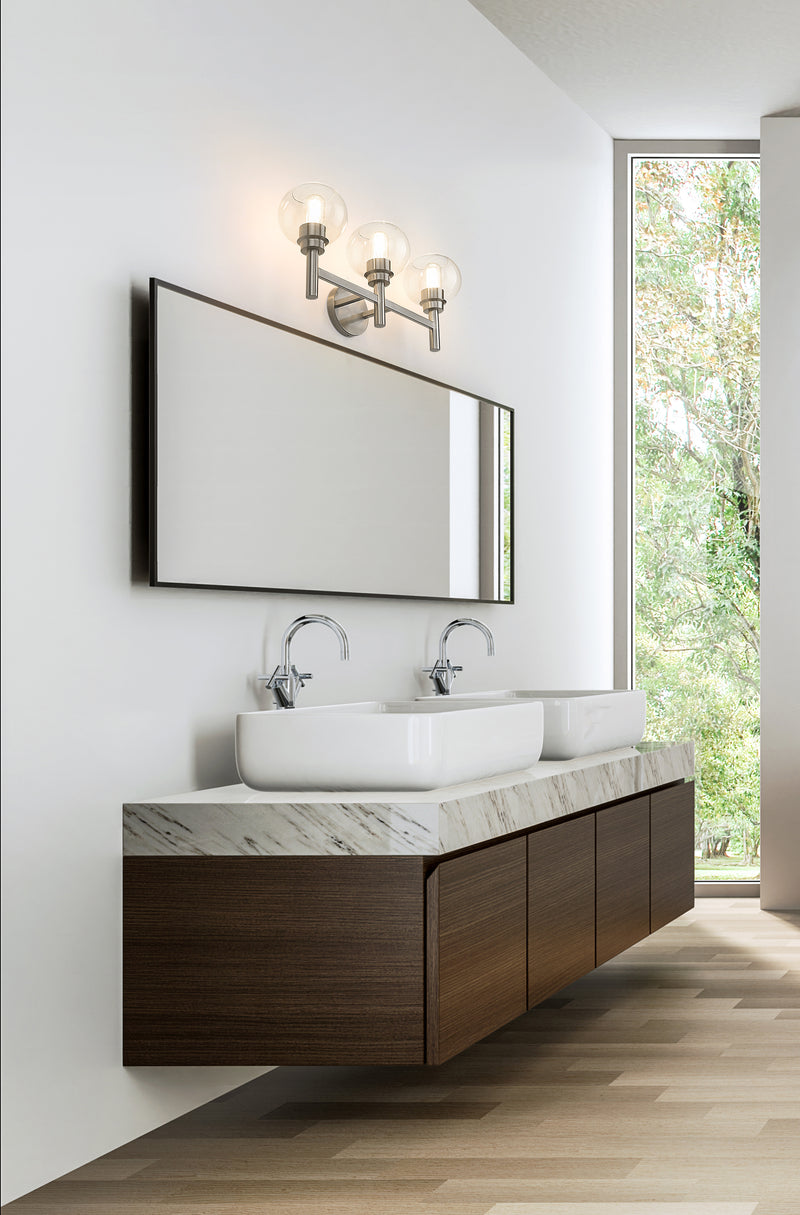 Sutton 3 Light 23.75" Vanity in Brushed Nickel in a room setting