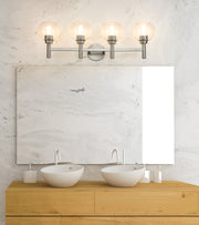 Sutton 4 Light 31.5" Vanity in Brushed Nickel in a room setting