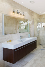 Sutton 4 Light 31.5" Vanity in Chrome in a room setting