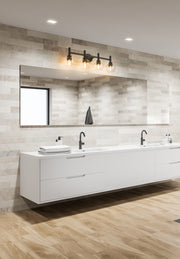 Sutton 4 Light 31.5" Vanity in Matte Black in a room setting