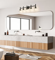 Sutton 5 Light 39.5" Vanity in Matte Black in a room setting